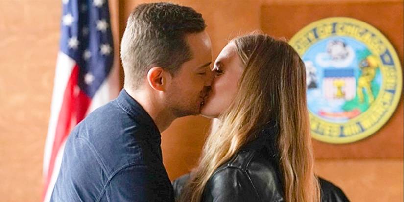 Hailey Upton and Jay Halstead share a kiss in Chicago PD