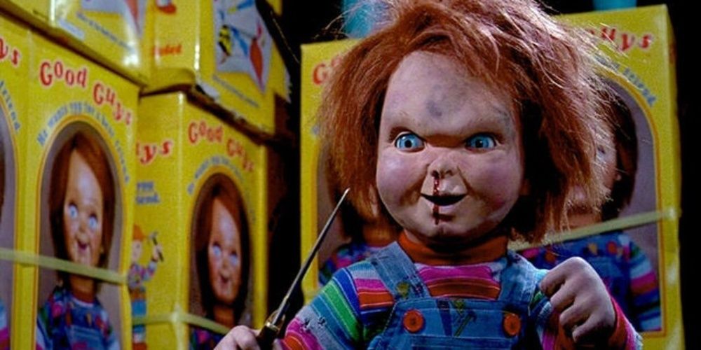 Chucky holding a knife in Child’s Play 2