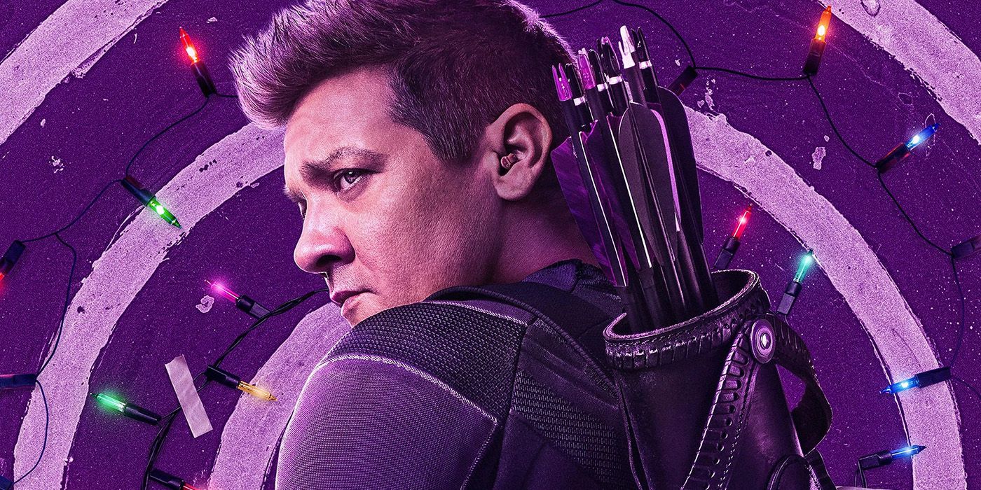 Clint Barton dons his Hawkeye garb in front of a bullseye and Christmas lights.