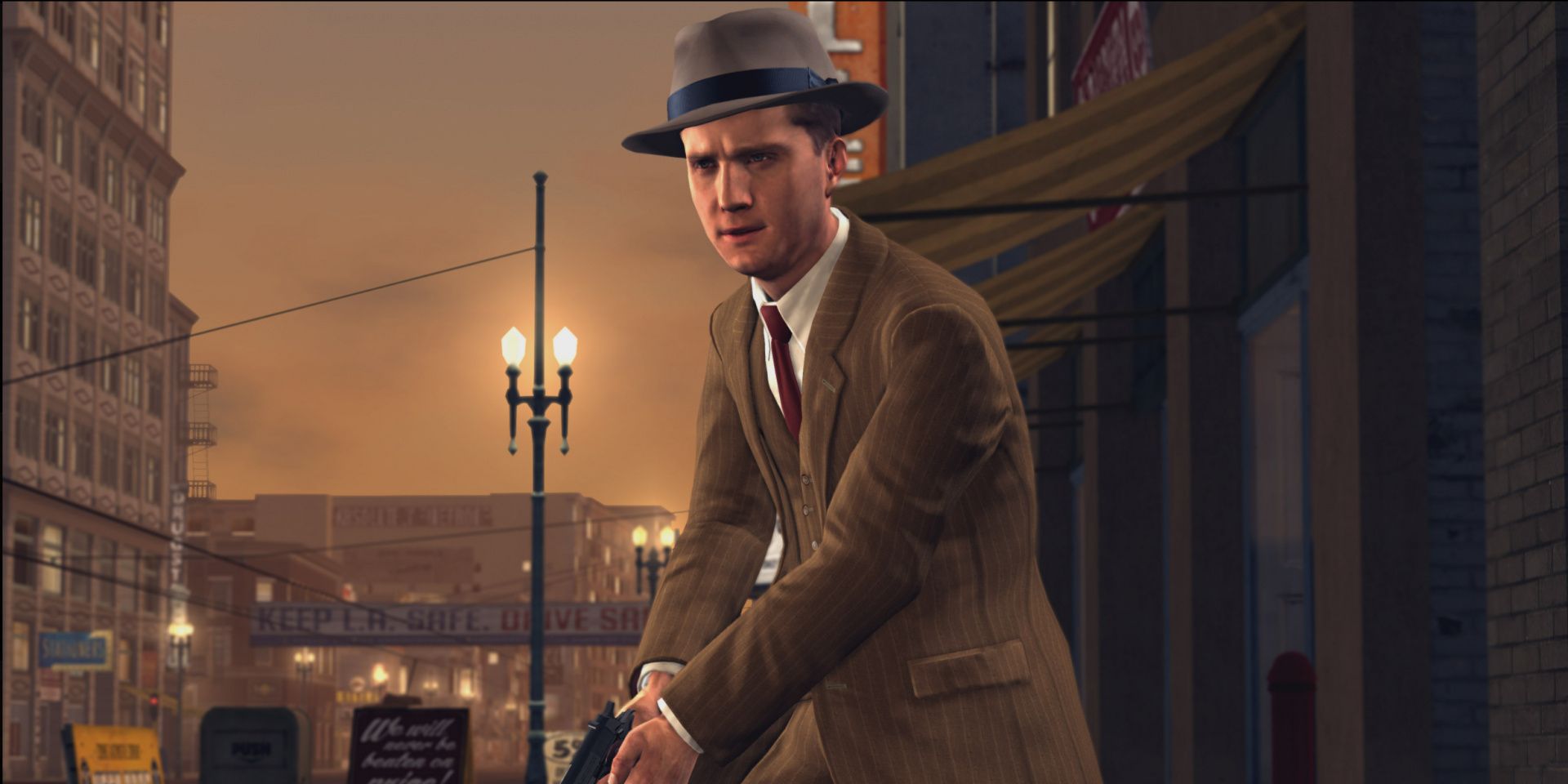 Cole Phelps walks with his pistol at the ready from L.A. Noire 