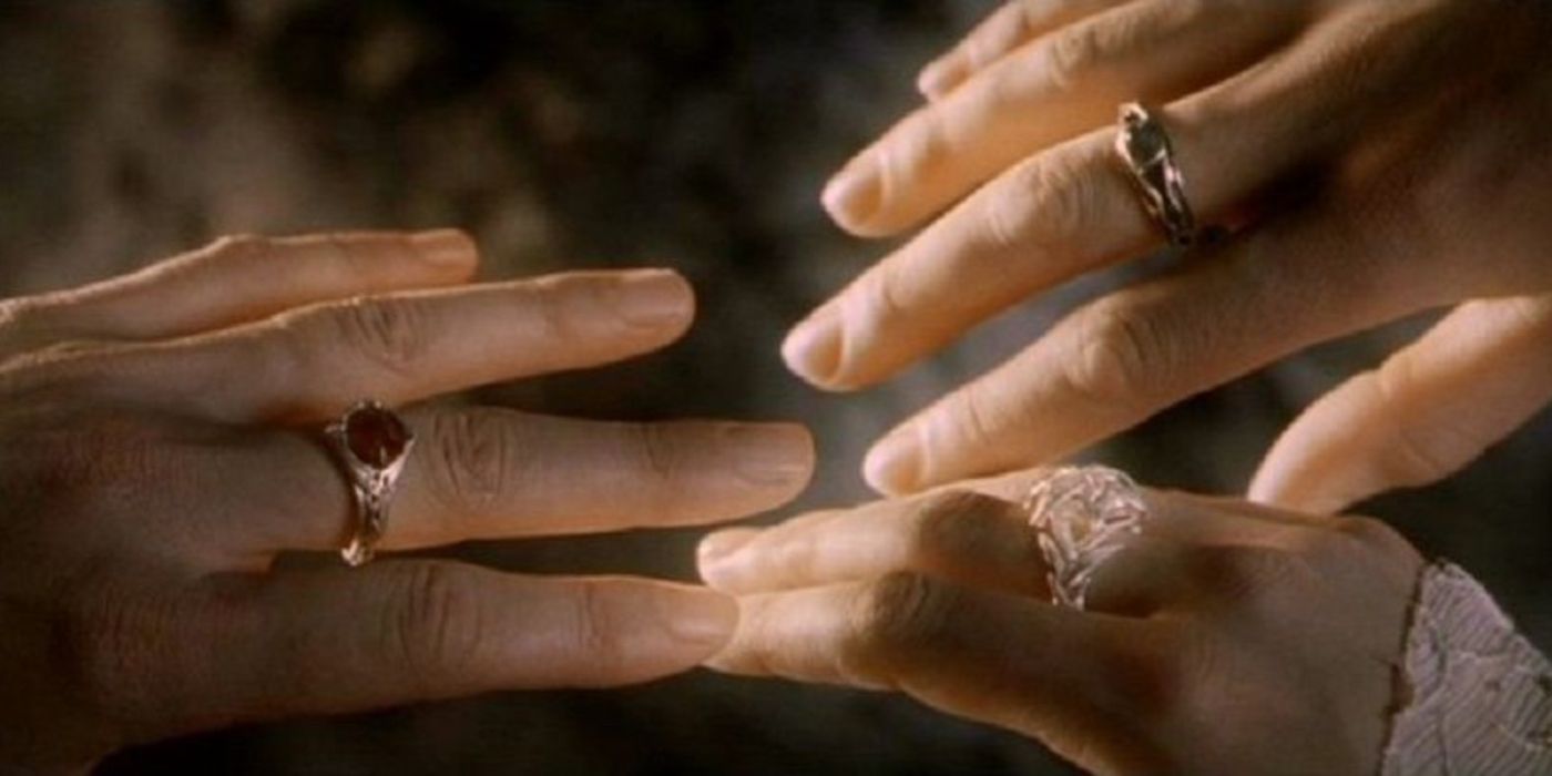 Close up of Elves hands with the rings of power
