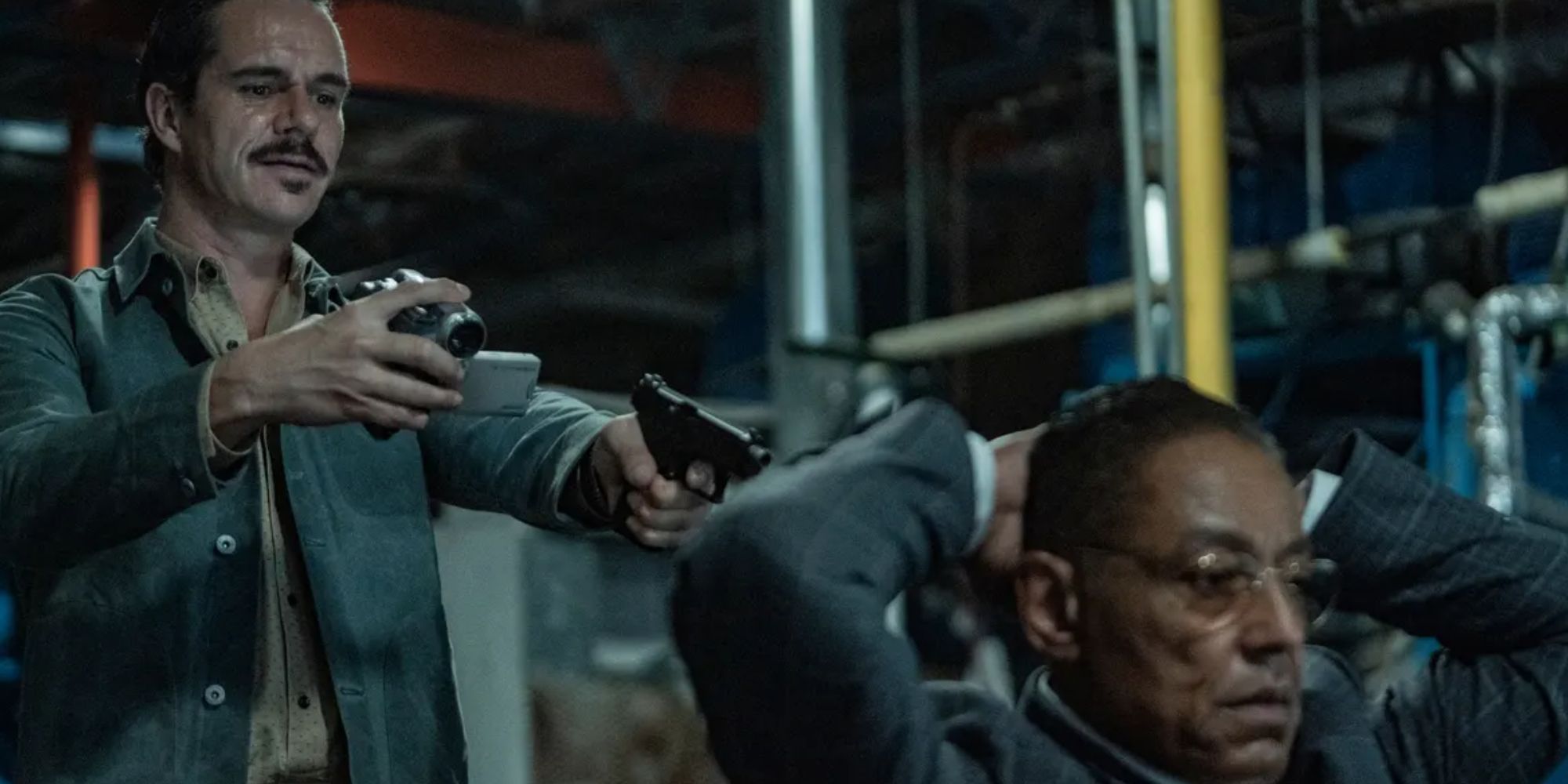 Lalo pointing a gun at Gus in Better Call Saul