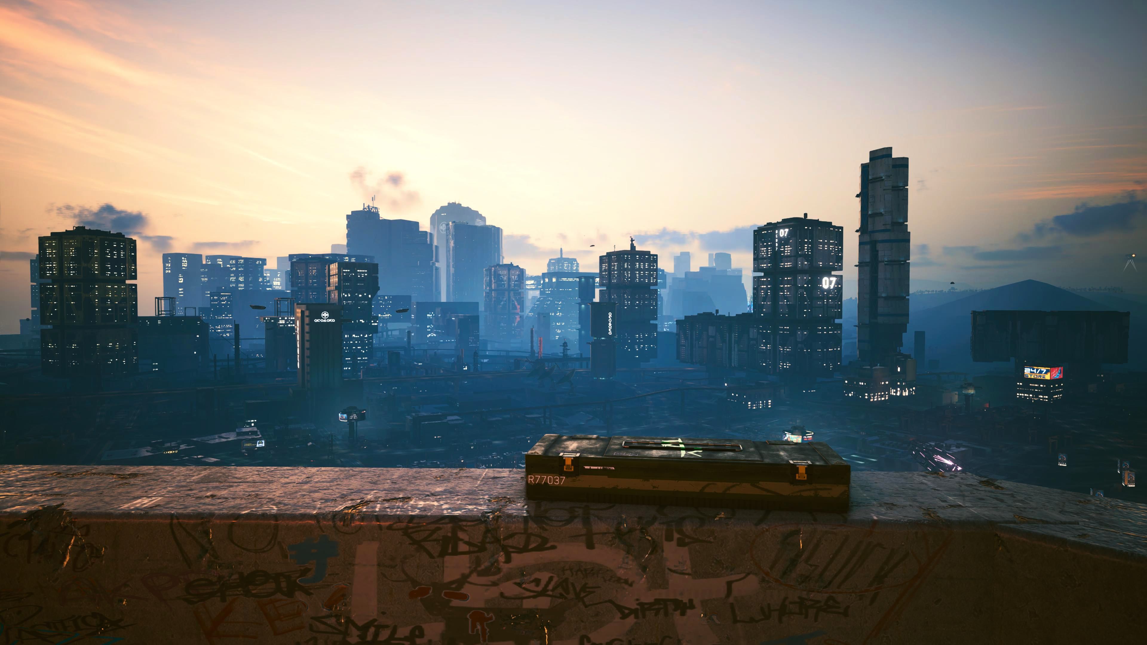 La vue depuis le haut d'un immeuble de Night City dans Cyberpunk 2077
