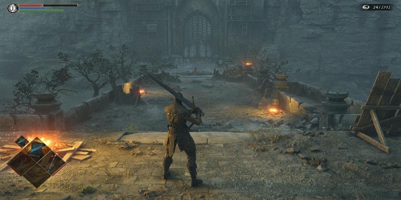 A player holding the Claymore in Demon's Souls PS5 remake.