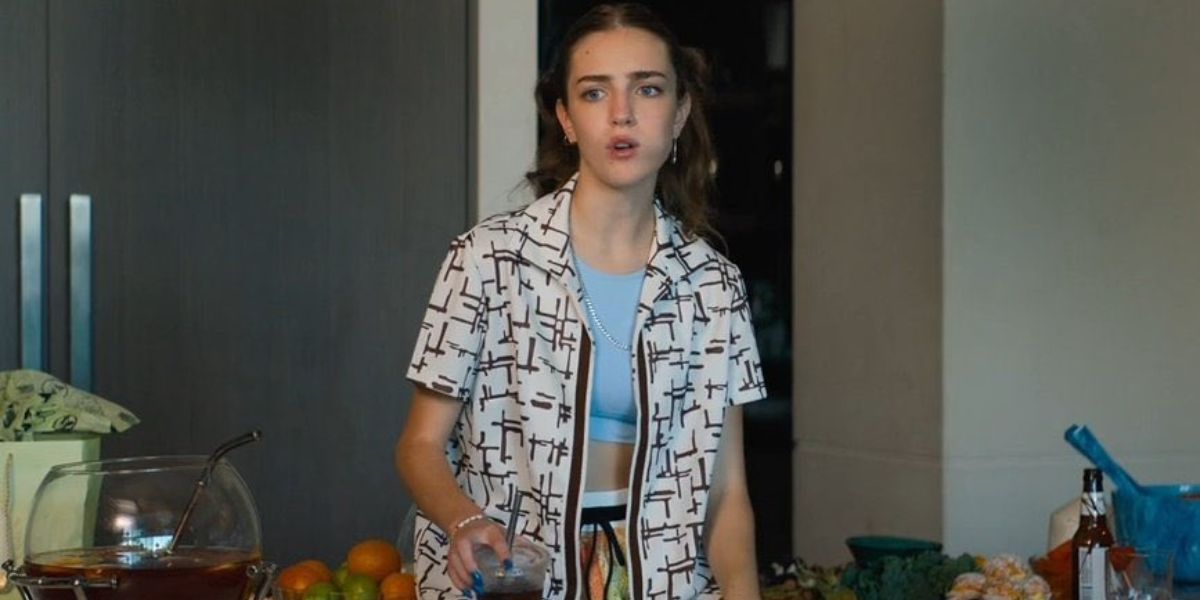 Gabbi sitting on the kitchen counter in Do Revenge