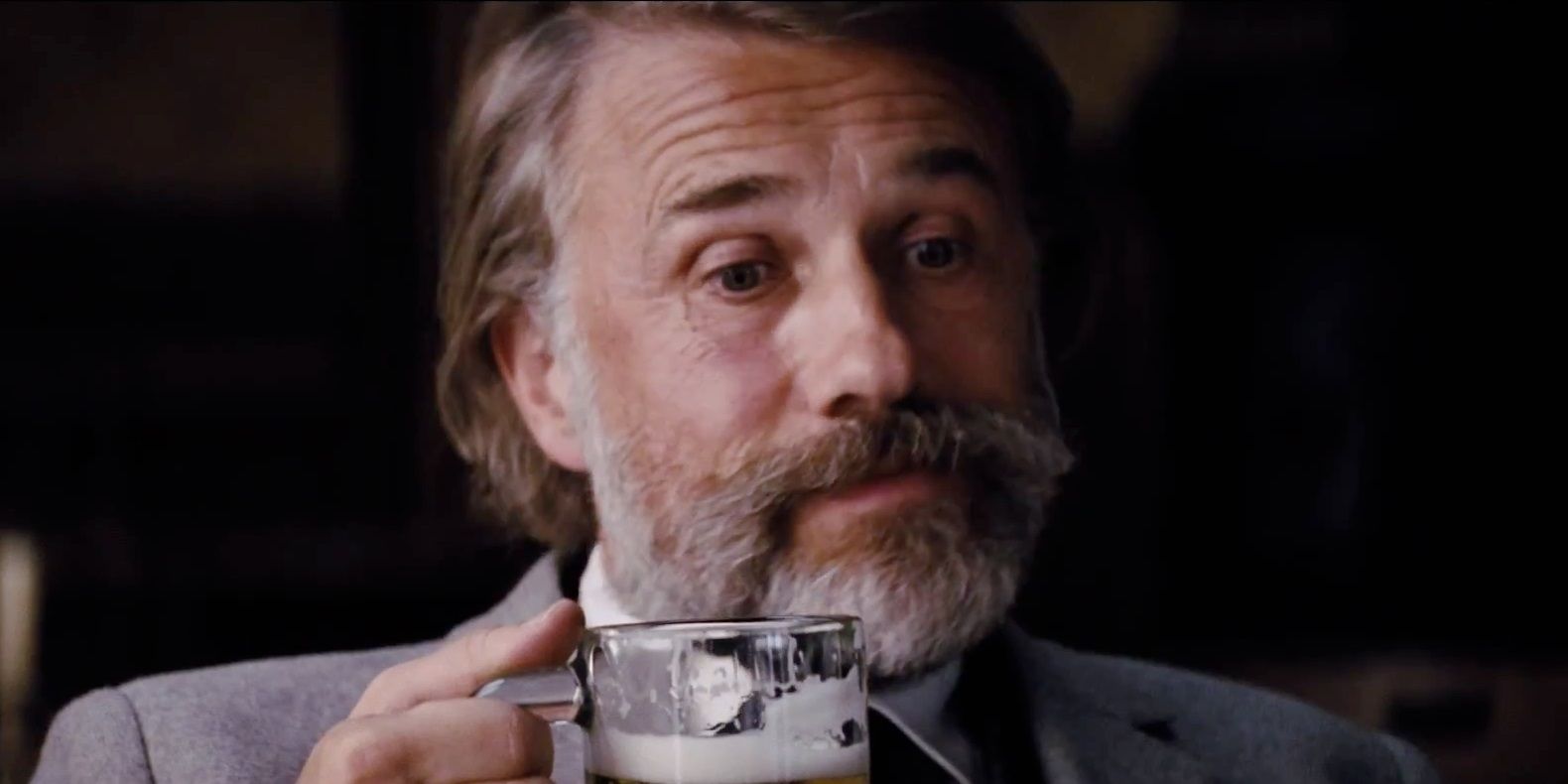 Dr Schultz drinks a beer in Django Unchained