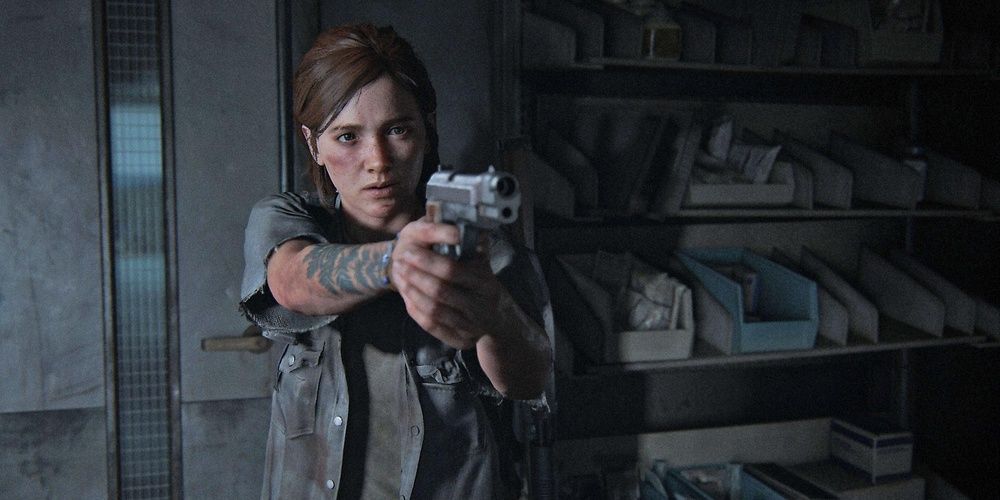 Ellie points a gun in The Last of Us Part II 