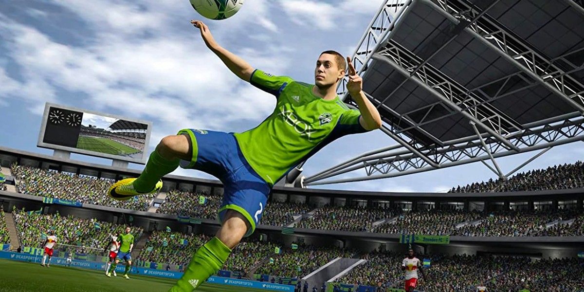 Seattle Sounders player leaps into the air to hit the ball in FIFA 15.