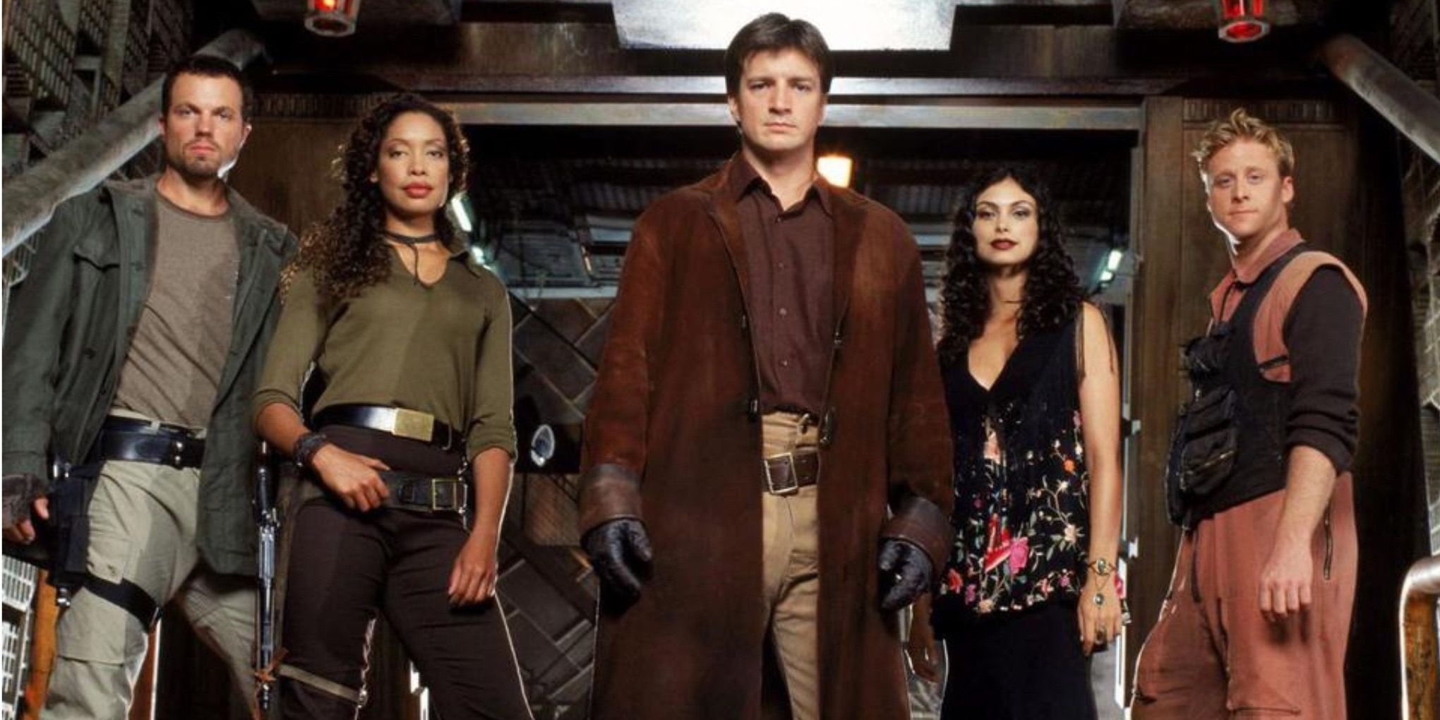 Firefly cast posing on a spaceship