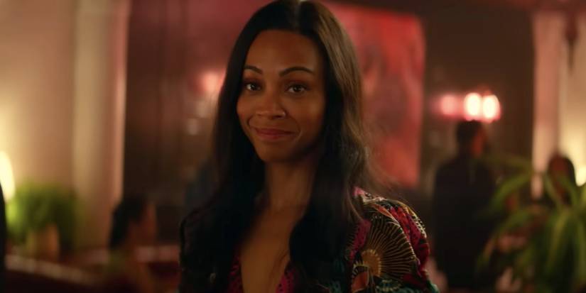 Zoe Saldana smirking in the From Scratch trailer