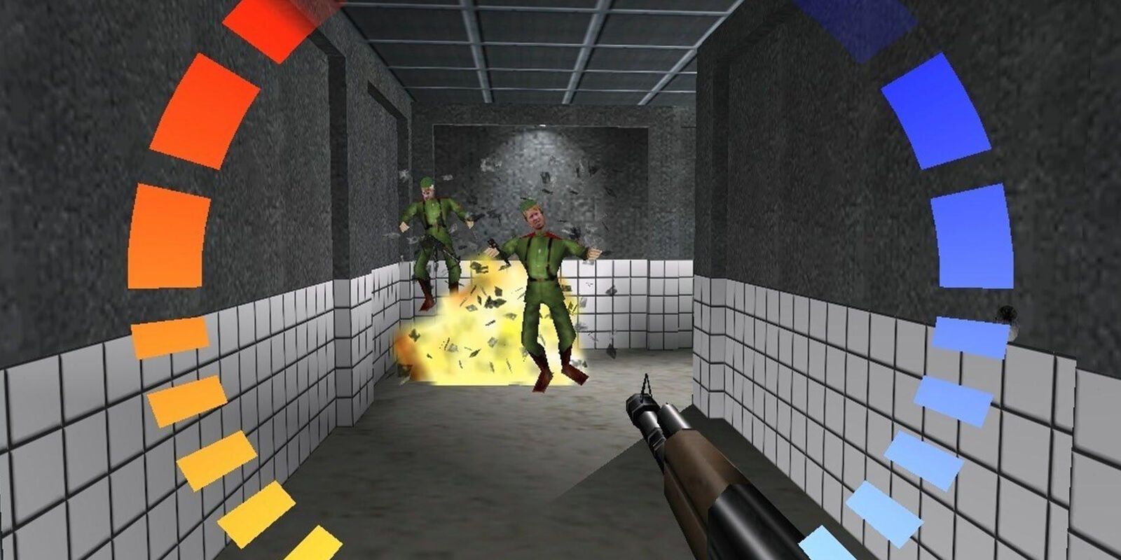 A screenshot from GoldenEye 007, showing two enemies being killed by an explosion down a hallway.