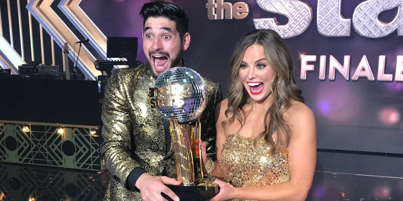 Hannah Brown The Bachelor with Mirror Ball Trophy and partner