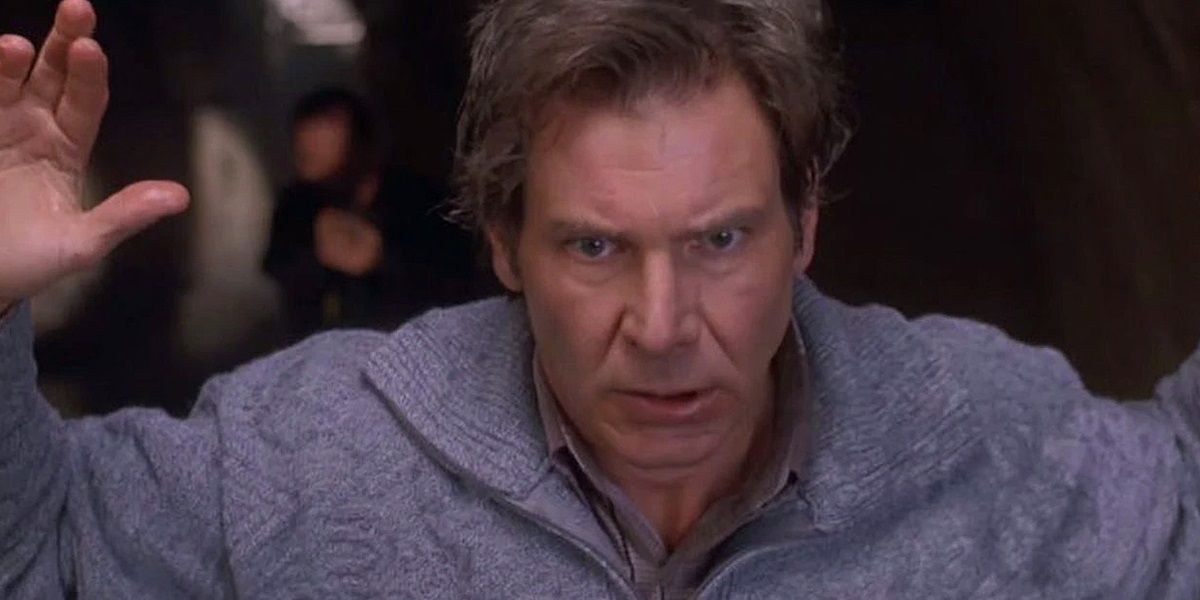 Harrison Ford dengan tangan terangkat di The Fugitive