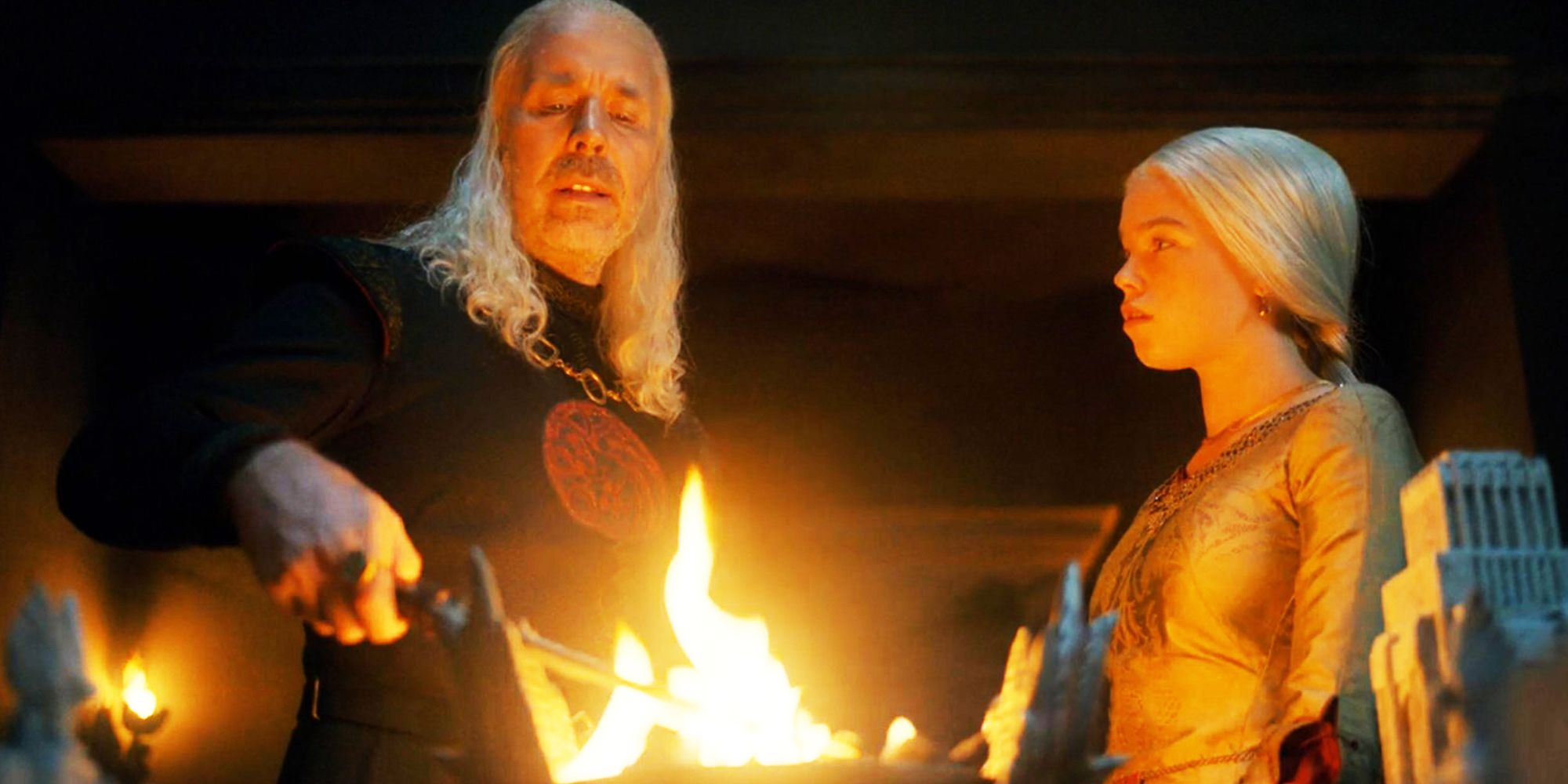 Viserys holding the catspaw dagger over a flame and revealing Aegon's dream to Rhaenyra in House of the Dragon