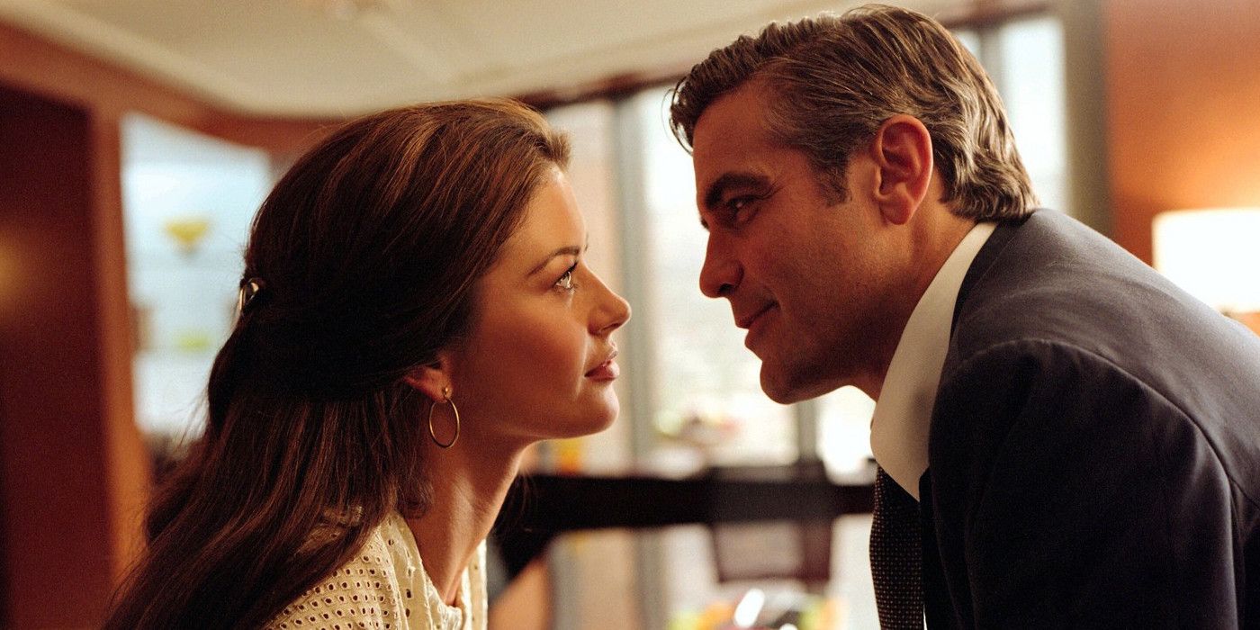 George Clooney as Miles and Catherine Zeta-Jones as Marilyn looking into each other's eyes in Intolerable Cruelty.