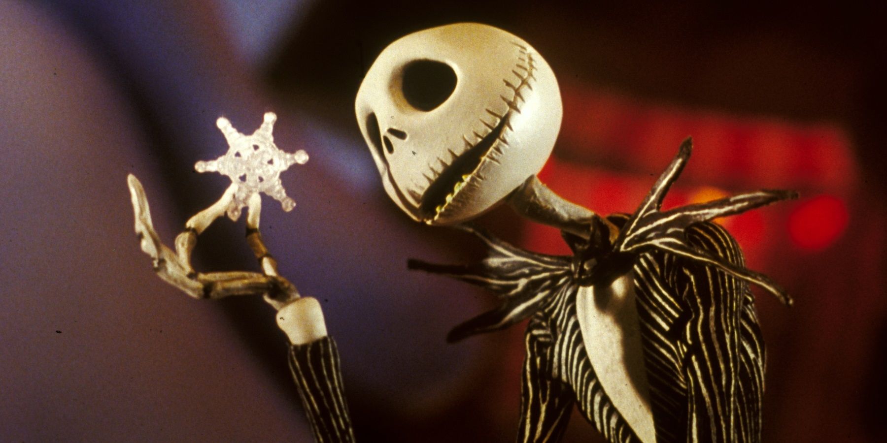 Jack Skellington holding a snowflake in The Nightmare Before Christmas