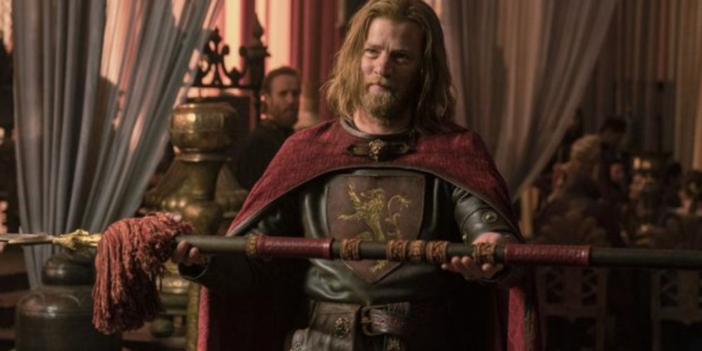 Jason Lannister holding a sword from House of the Dragon. 