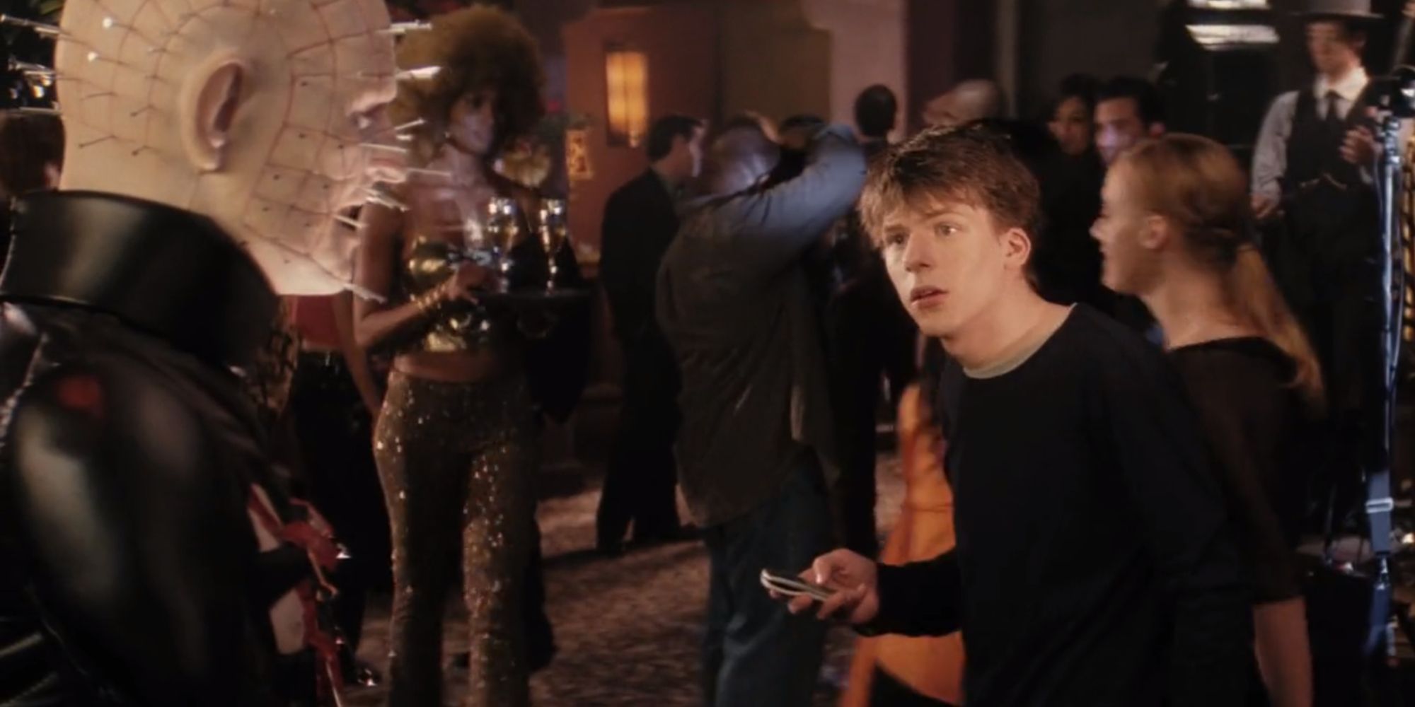 Jimmy spotting a Pinhead statue in the Tinsel nightclub in Wes Craven's Cursed (2005)