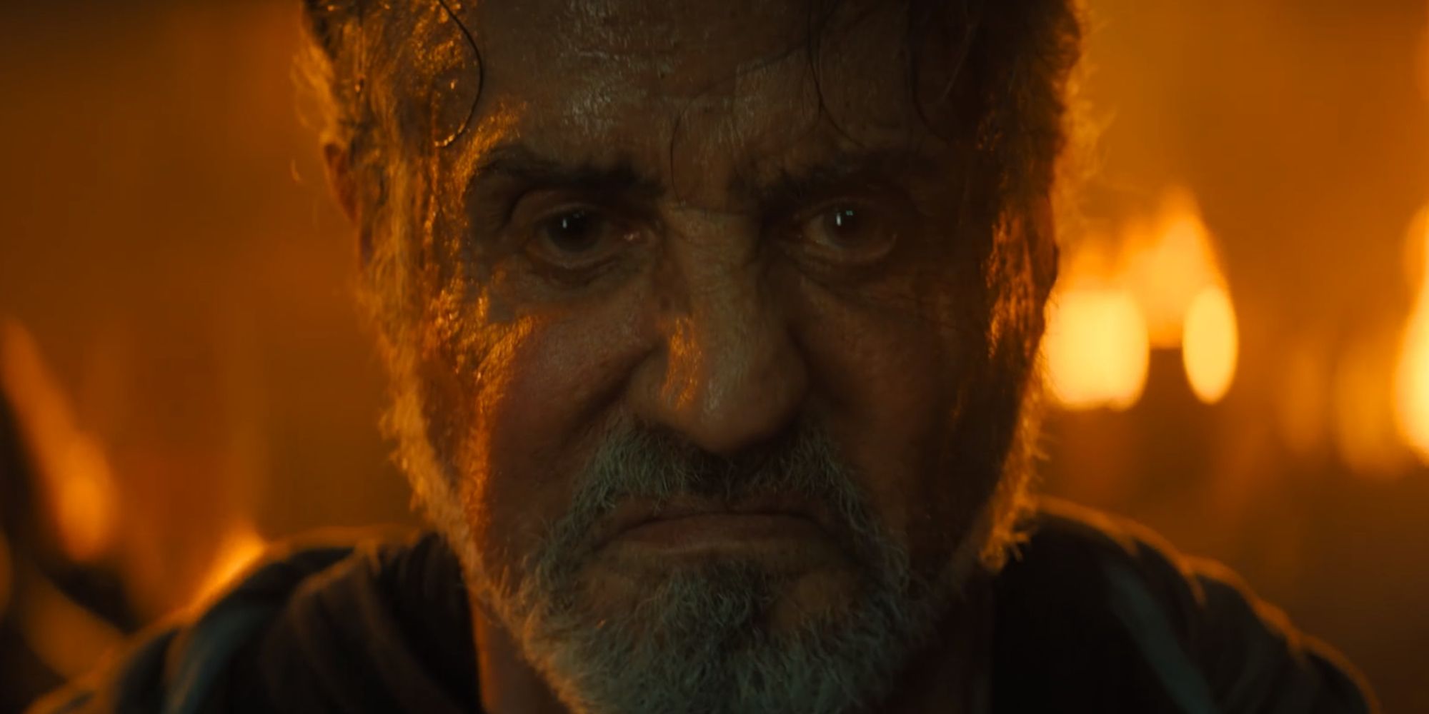 Joe becoming enraged in a flaming warehouse in Samaritan-(2022)