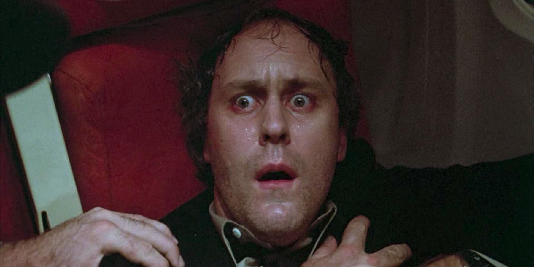 John Lithgow sweating in Twilight Zone The Movie