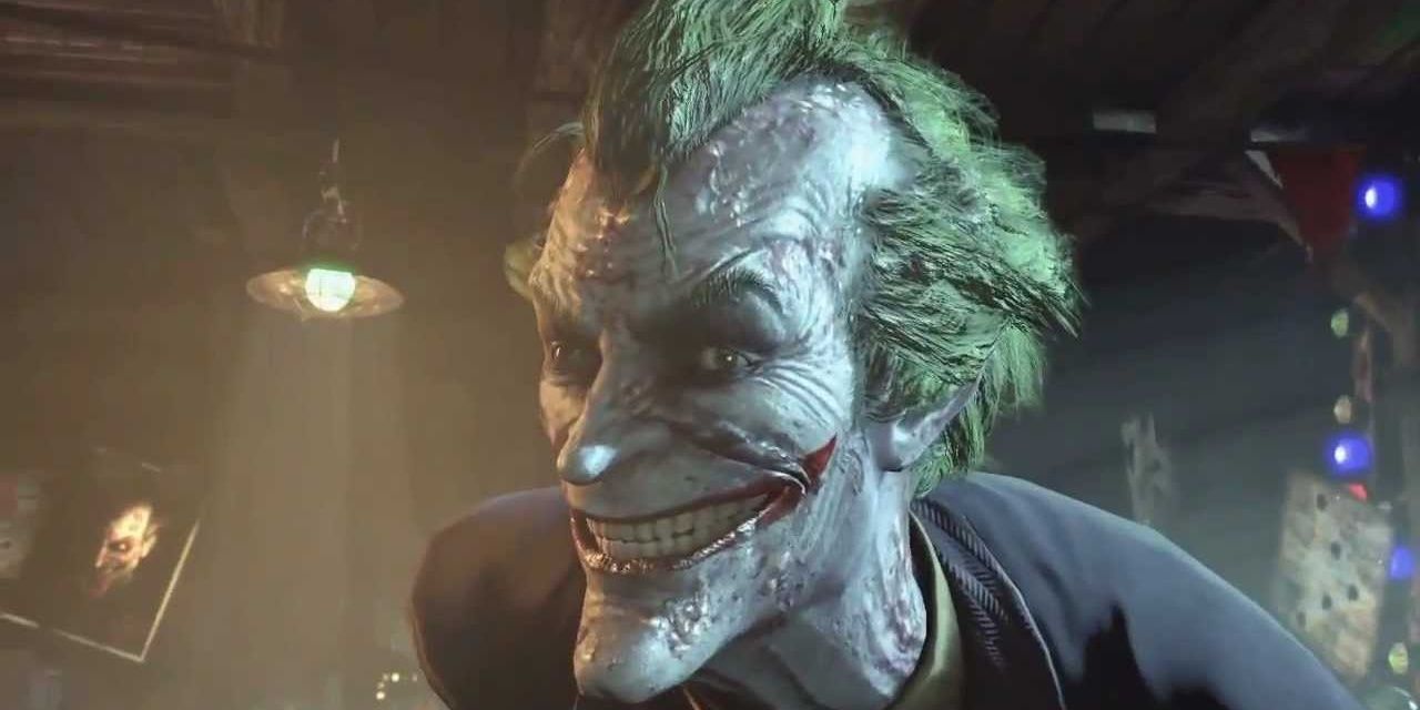 Joker sneering into the camera in Batman Arkham City 