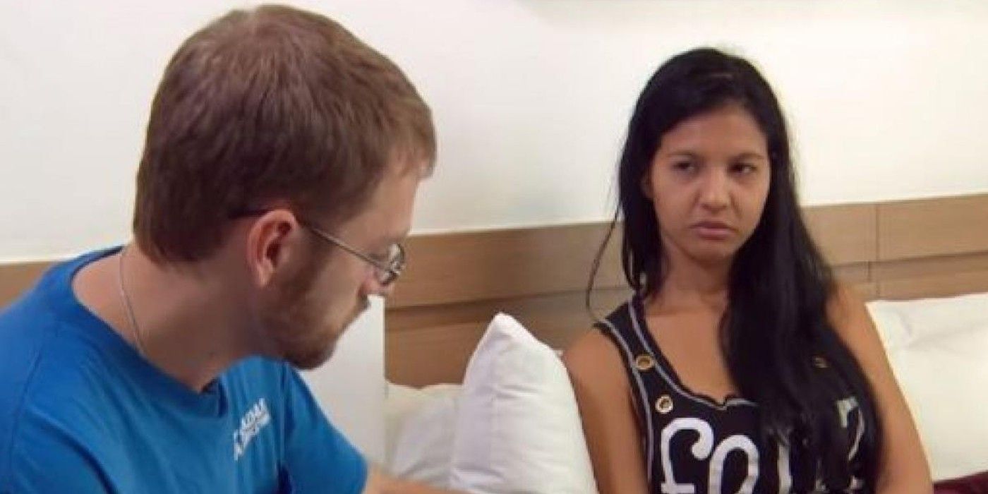 Karine Martins and Paul Staehle in 90 Day Fiancé looking grumpy in bed