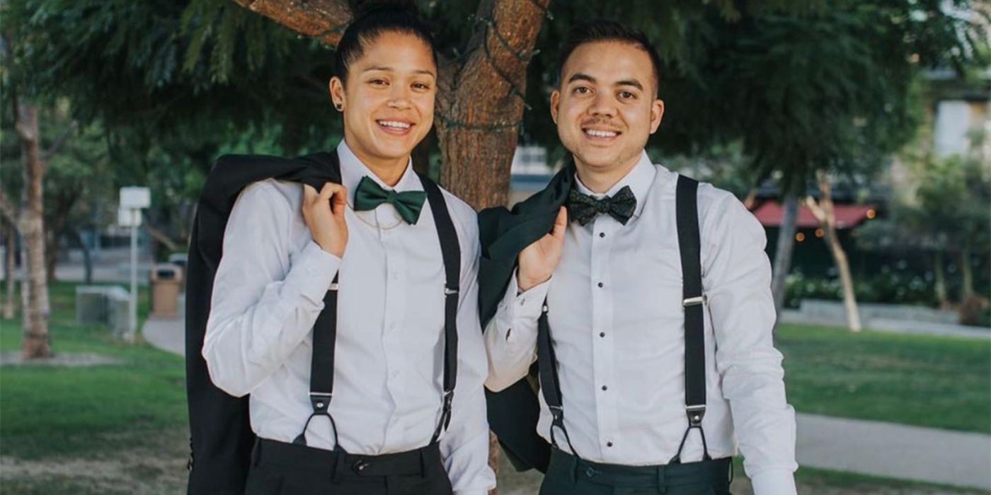 Kaycee and Kenny Clark posing in matching tuxes.