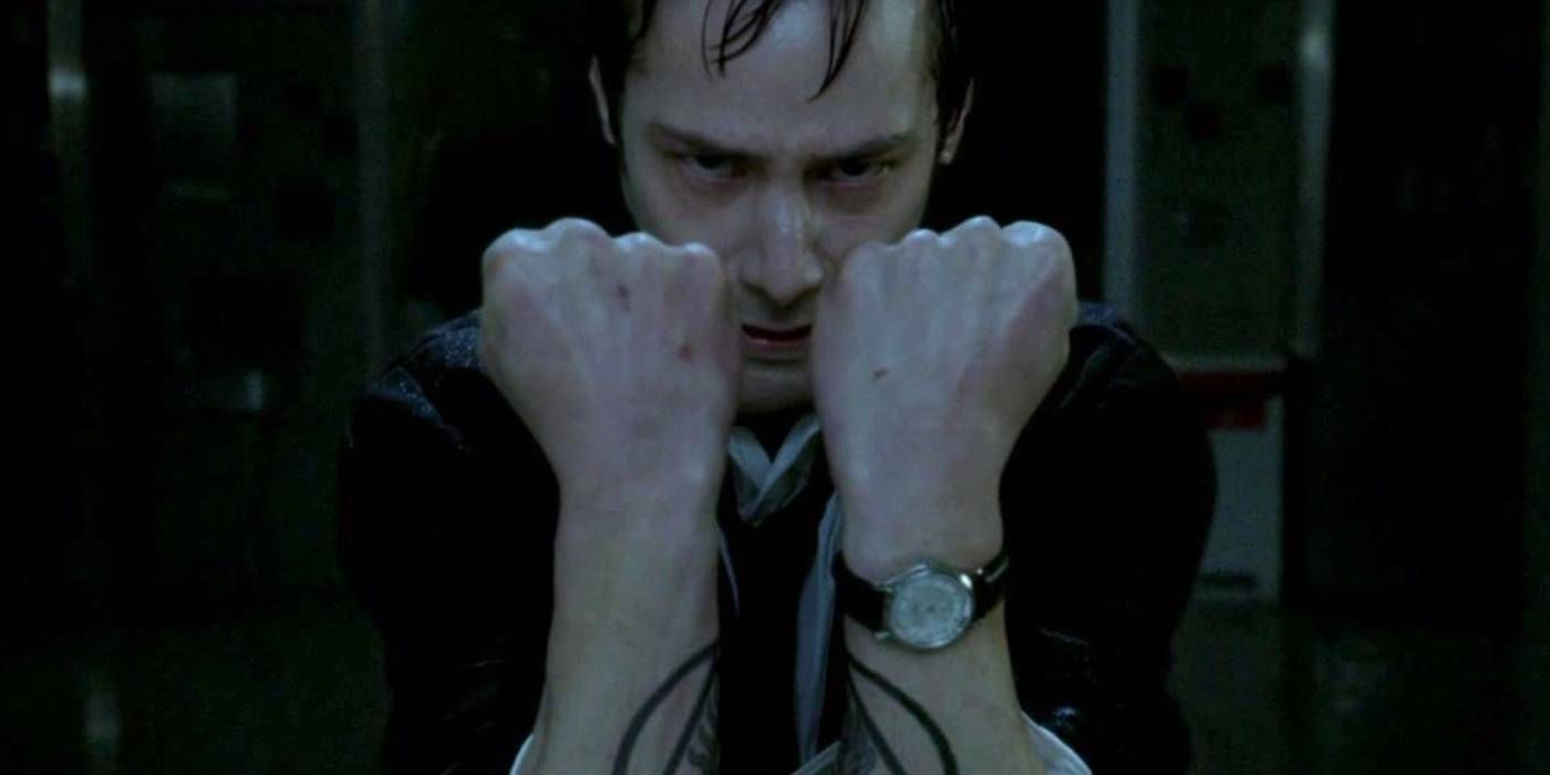 Keanu Reeves in Constantine holding fists in front of his face