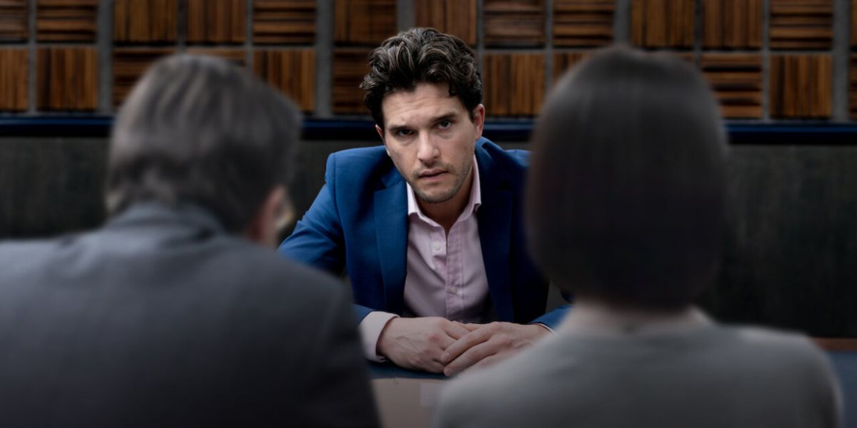 Kit Harington being interrogated at a table in Criminal: United Kingdom