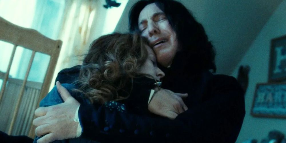 Snape holding Lily's body after Voldemort killed her in Harry Potter. 