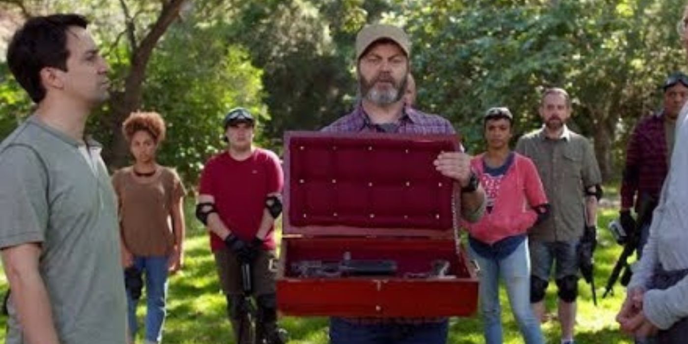 Lin Manuel Miranda standing with the cast of Hamilton while Nick Offerman offers a paintgun in Curb Your Enthusiasm