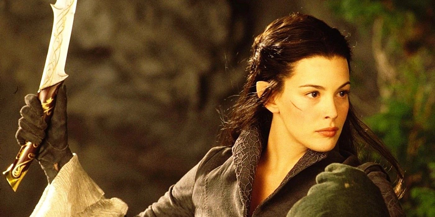 Arwen holding a sword in Lord of the Rings. 
