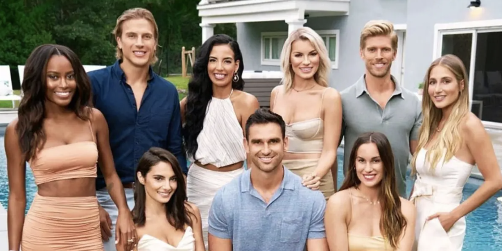 Men and women pose by the pool in Summer House 