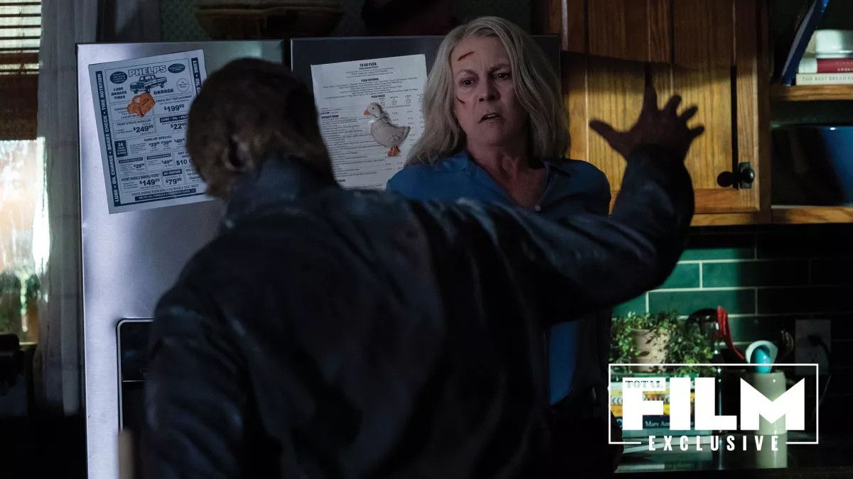 Jamie Lee Curtis battles Michael Myers in a kitchen in Halloween Ends