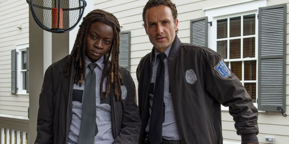 Michonne and Rick as police officers in The Walking Dead 