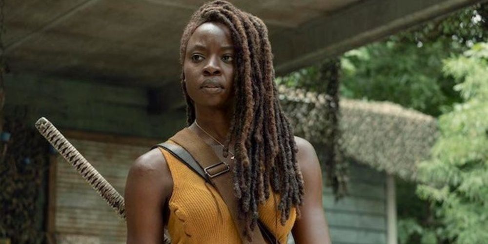 Michonne standing on the porch in The Walking Dead 