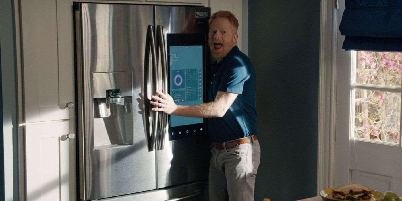 Mitch singing a duet with the fridge on Modern Family