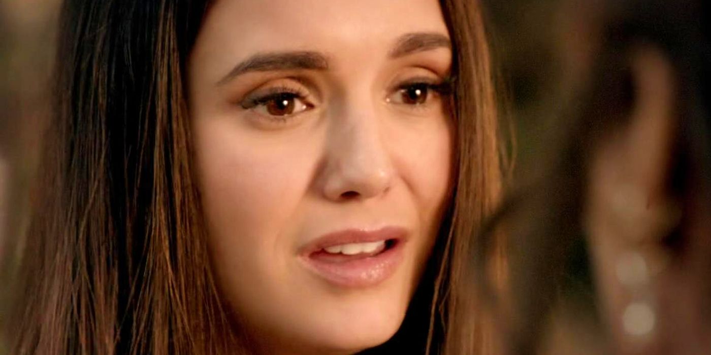 an extreme close up of Nina Dobrev looking distressed in The Vampire Diaries
