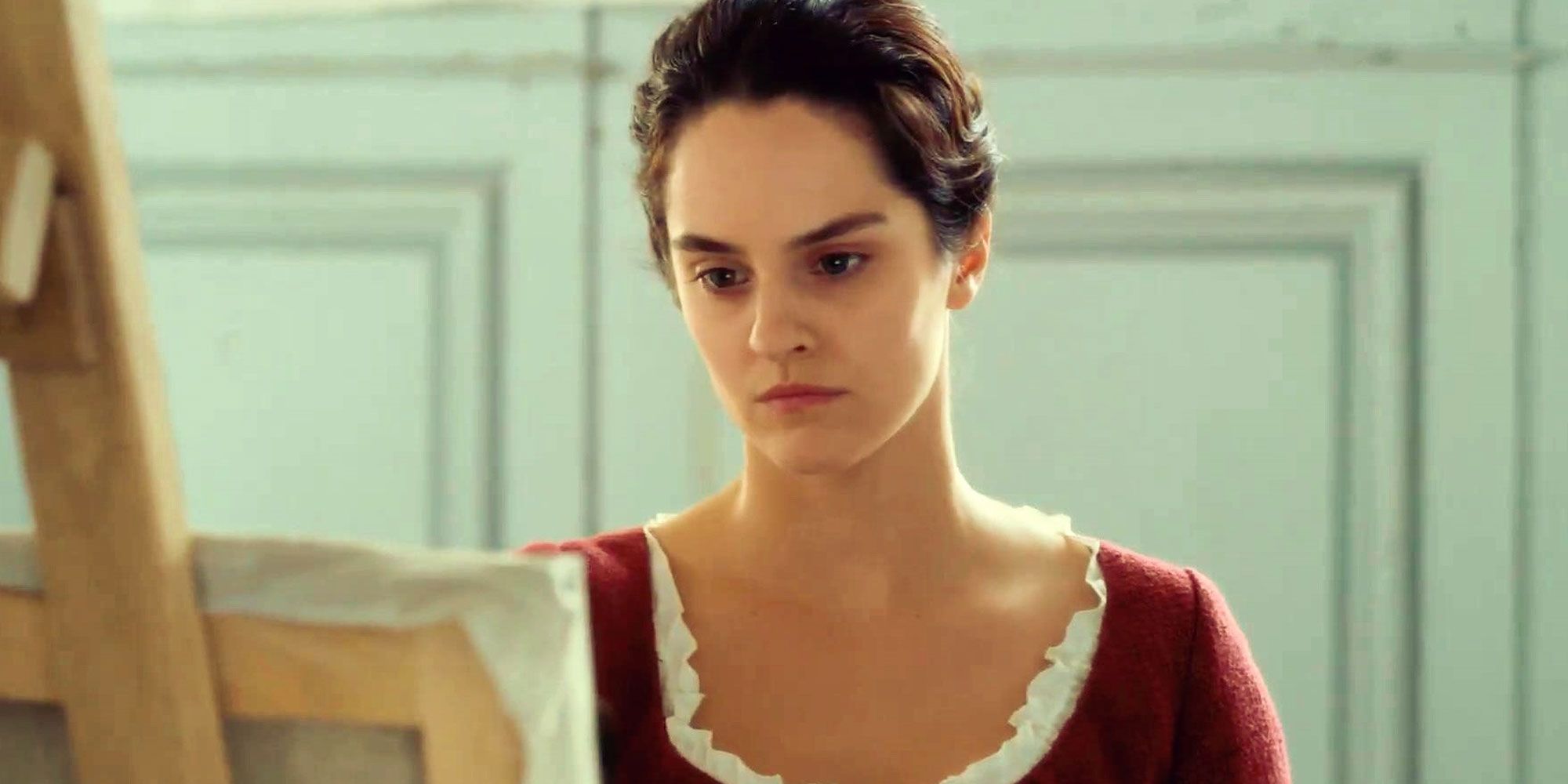 Noémie-Merlant looking serious in Portrait Of A Lady On Fire (2019)