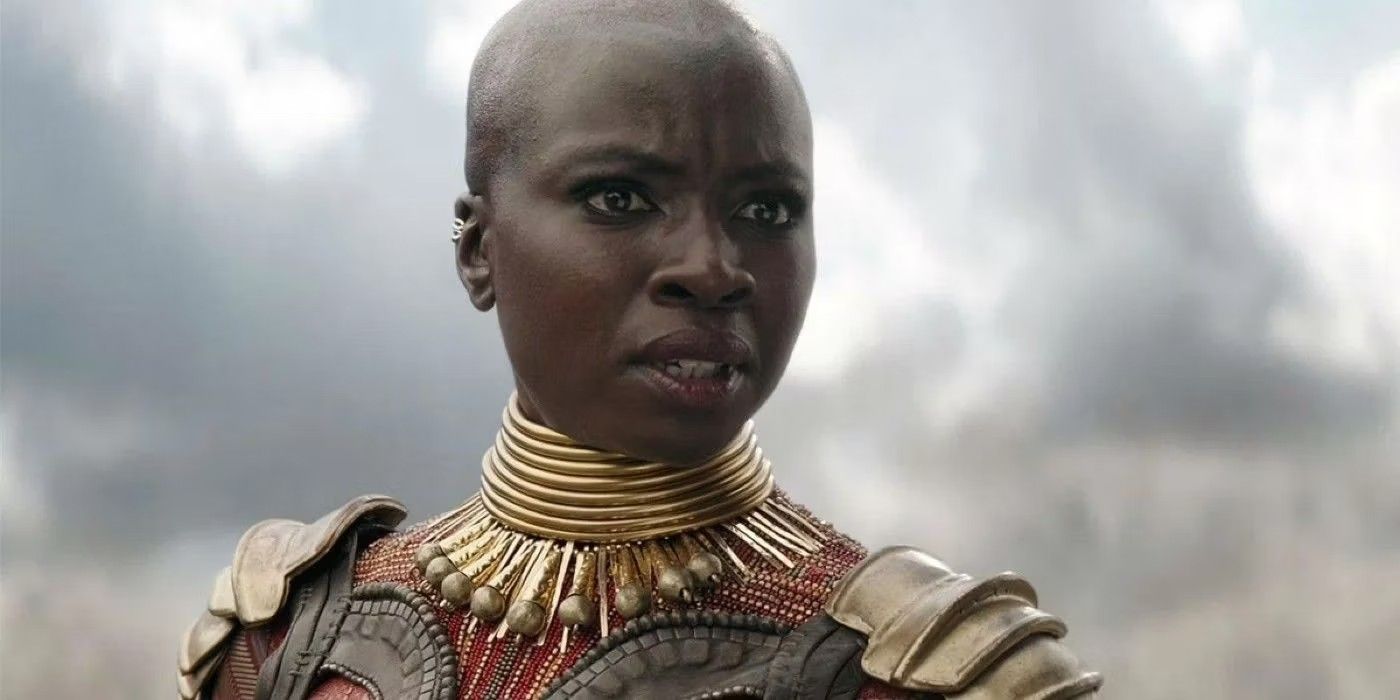 Okoye in Avengers Infinity War battle looking at Scarlet Witch