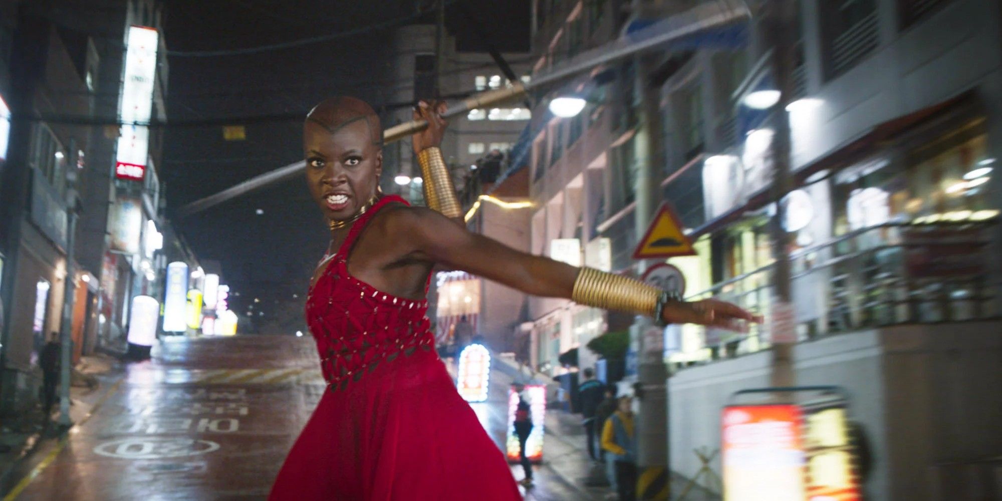 Okoye throwing a spear in Black-Panther