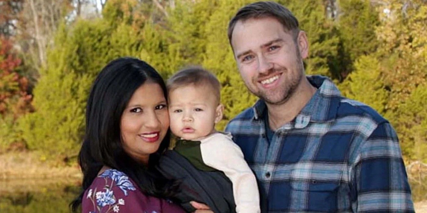 Paul Staehle and Karine Martins from 90 Day Fiancé smiling with their baby