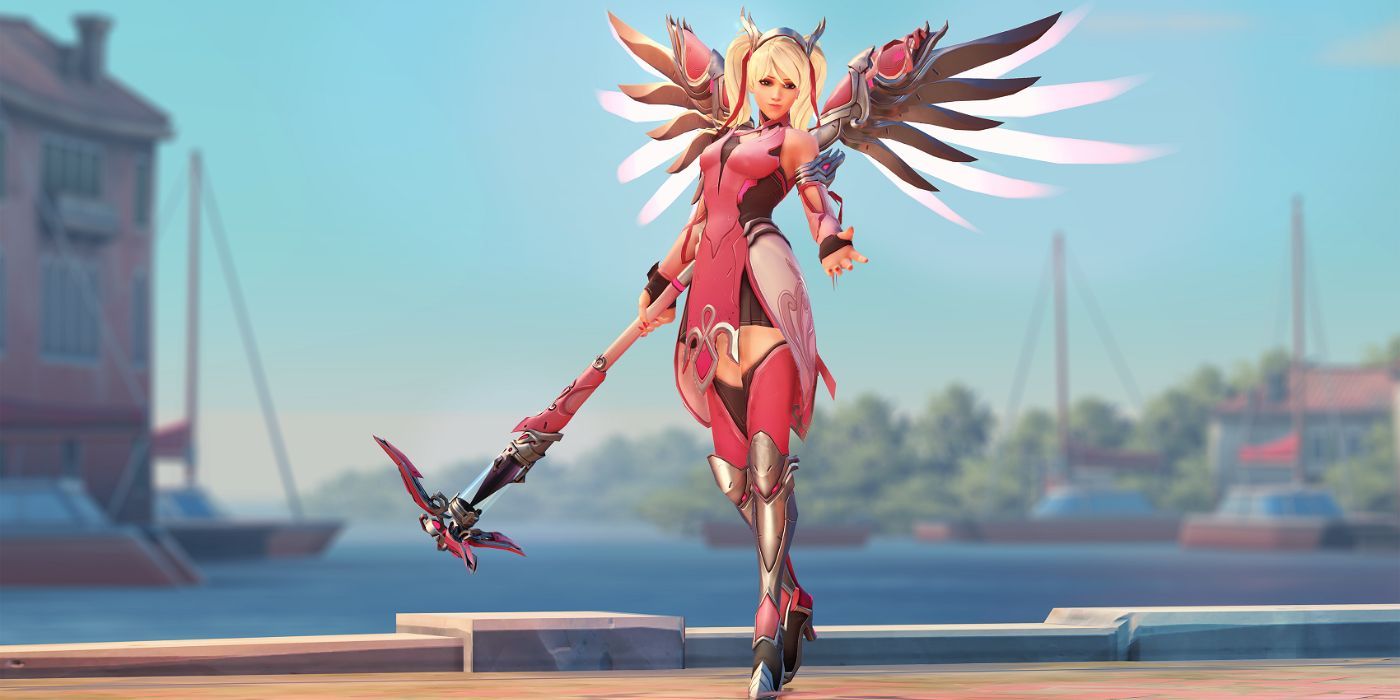 A Mercy wearing the Pink Mercy Skin in Overwatch, floating gracefully and extending her hand towards the camera.