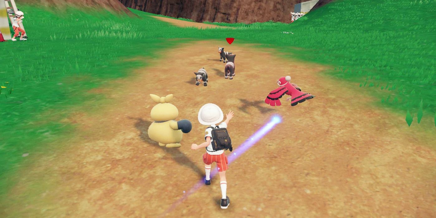 A Trainer surrounded by several Pokémon in Scarlet & Violet.