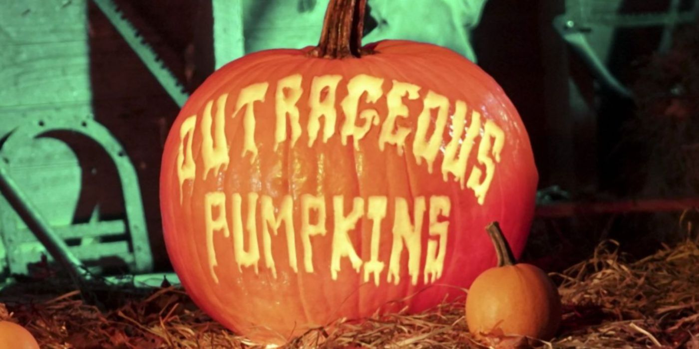 Pumpkin that's carved to say Outrageous Pumpkins