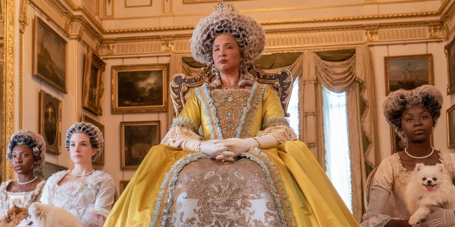Queen Charlotte Bridgerton Prequel with Queen Charlotte in a yellow dress sitting down.