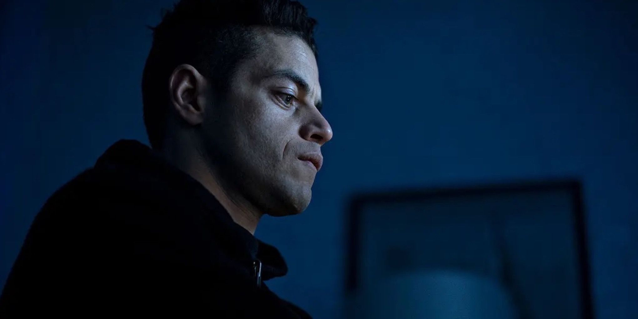 Rami Malek as Elliot Alderson staring at something off-screen on Mr. Robot (2015-2019)