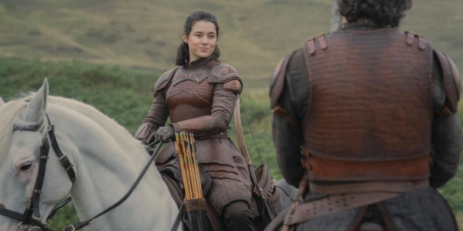 Rhea Royce on a horse smiling in House of the Dragon