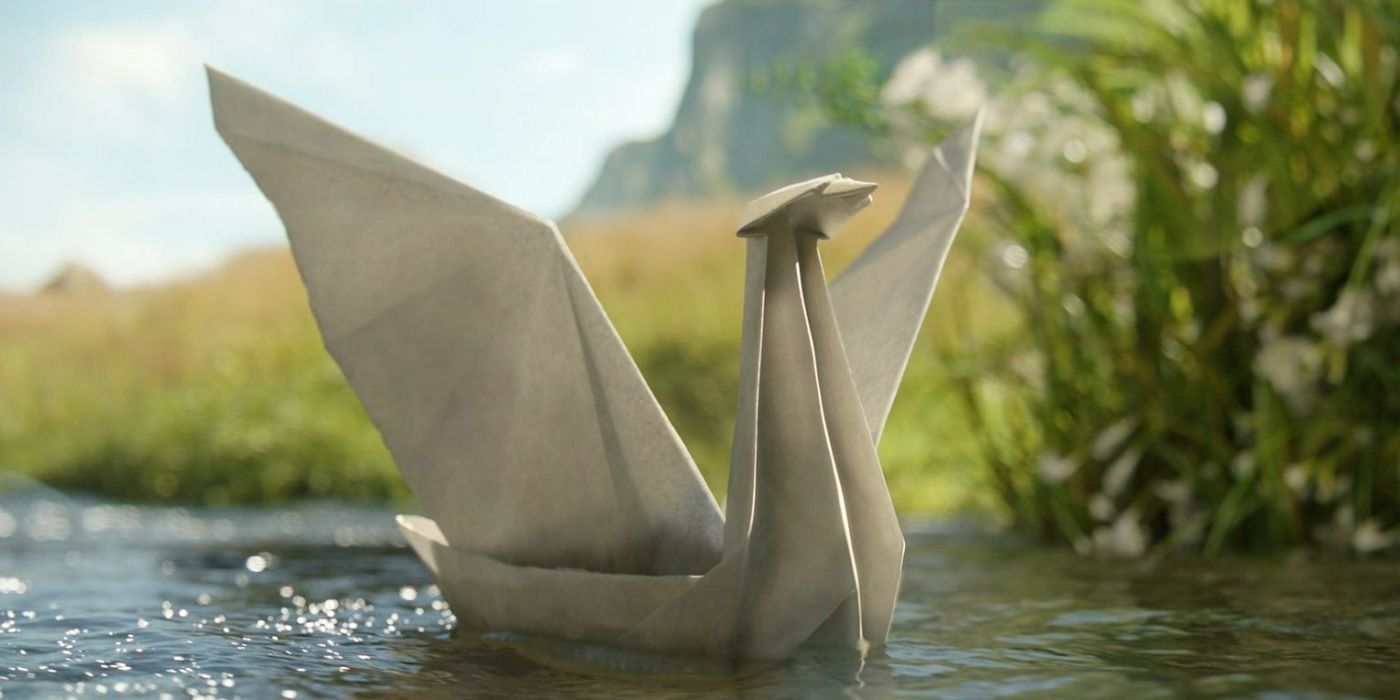 O barco de papel de Galadriel flutuando em um rio em Os Anéis do Poder