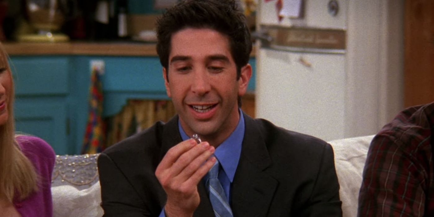 Ross Smiling and Holding an Engagement Ring in Friends